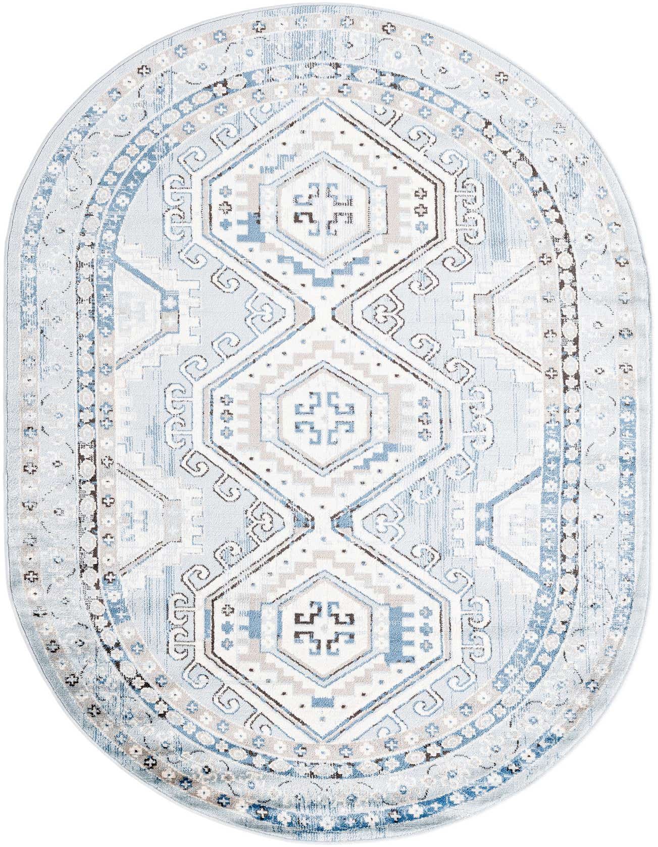 An oval 5'3" x 8'0" blue and white tribal rug with a traditional Southwestern pattern and thin pile.