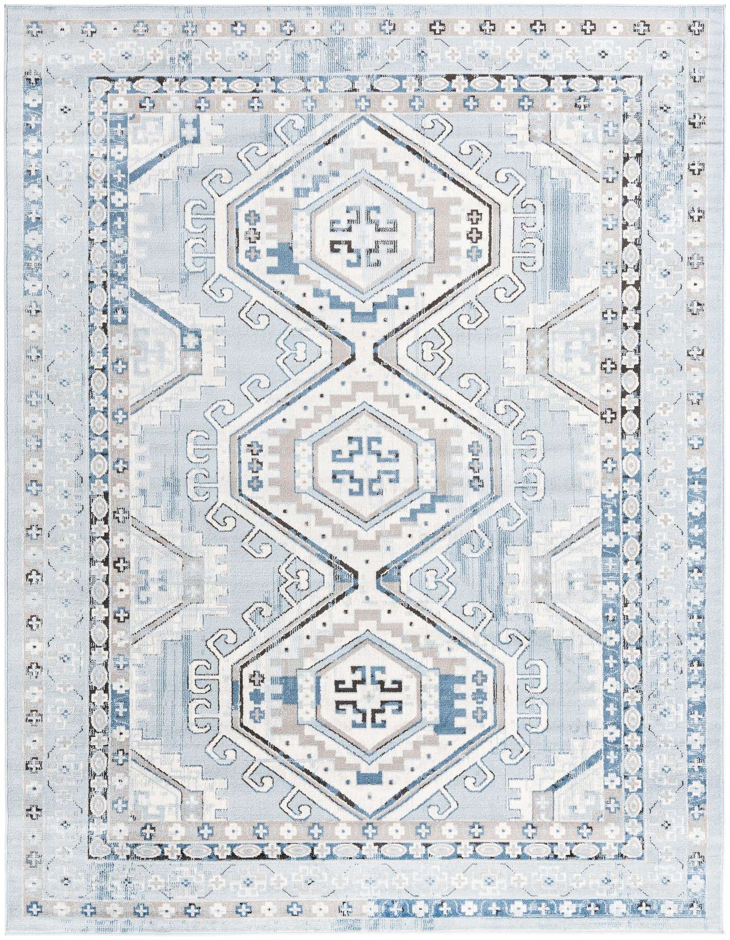 A 7x10 rectangular Charlotte Collection rug with a traditional tribal pattern in various shades of blue, grey, and white.