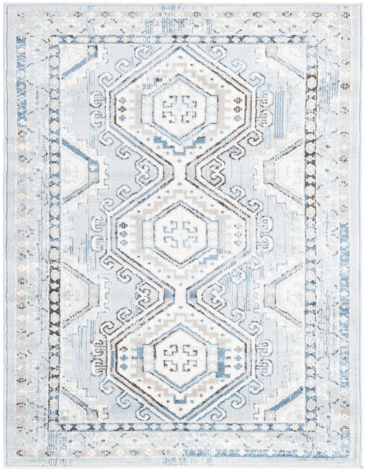 A 3x5 rectangular Charlotte rug by Rugs.com with a traditional tribal pattern in various shades of blue, white, and brown.