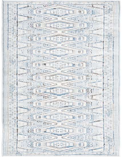 A light blue 10 ft runner rug with a distressed traditional tribal pattern, ideal for a hallway.