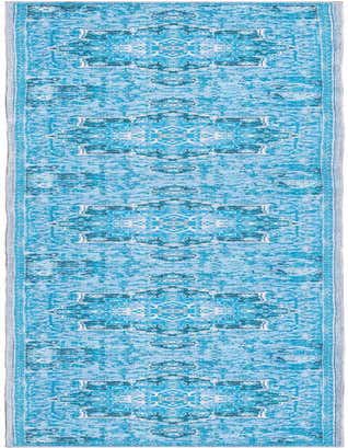 A 13 ft runner rug in shades of blue with a distressed traditional medallion pattern, ideal for a hallway.