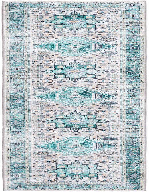 A long 8 ft runner rug with a distressed Bohemian medallion pattern in shades of blue, green, and cream.