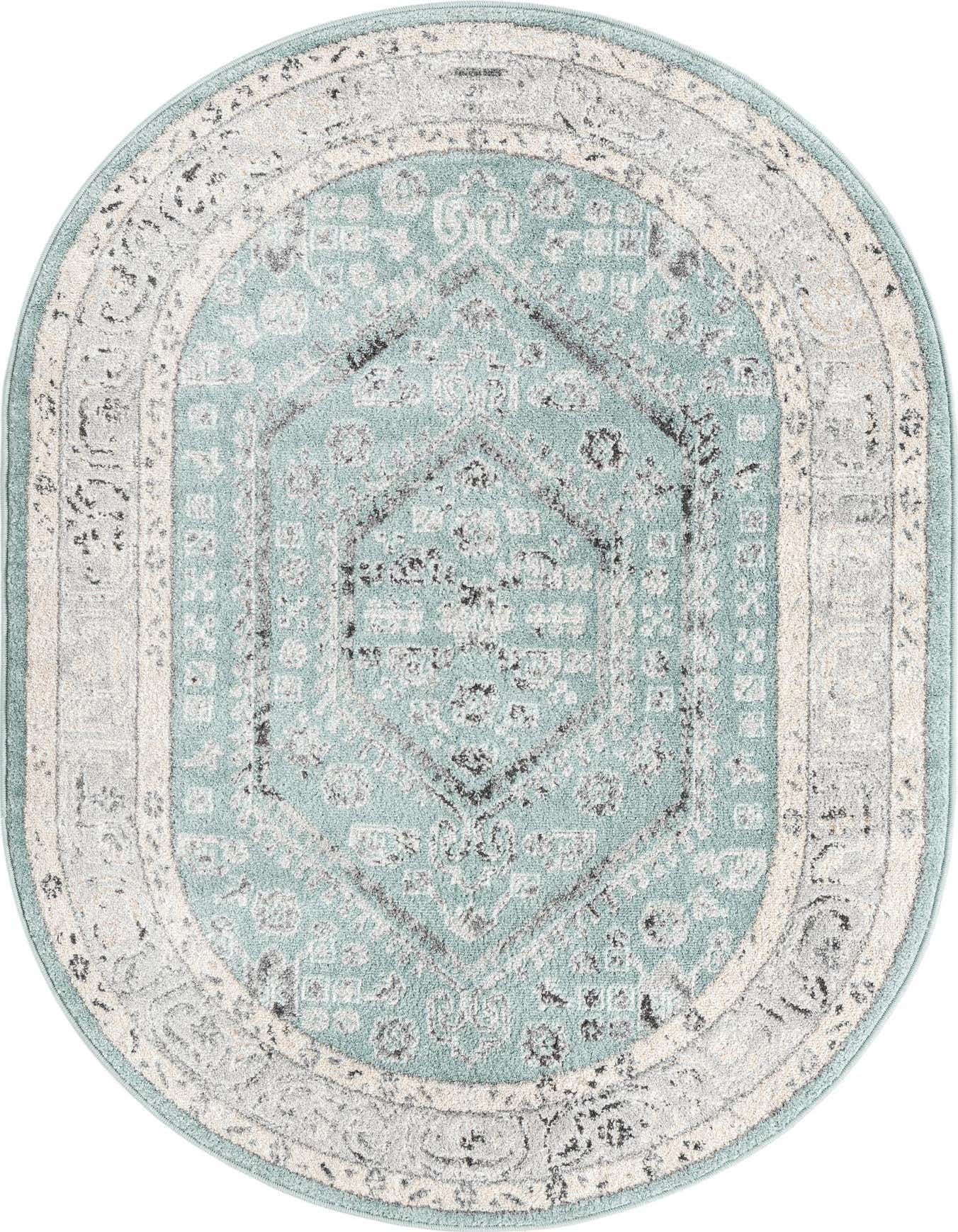 An oval 4' x 6' Aurelia Collection rug featuring a distressed traditional medallion pattern in shades of blue, grey, and cream.