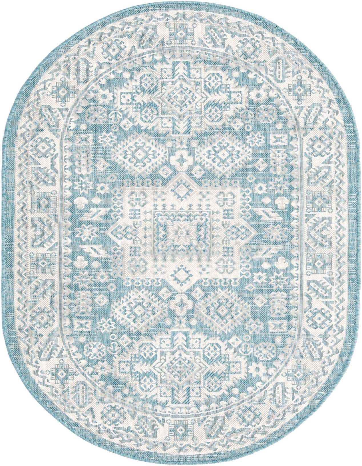 A 3' x 5'3 oval blue and white Southwestern rug with intricate tribal patterns, ideal for indoor or outdoor spaces.
