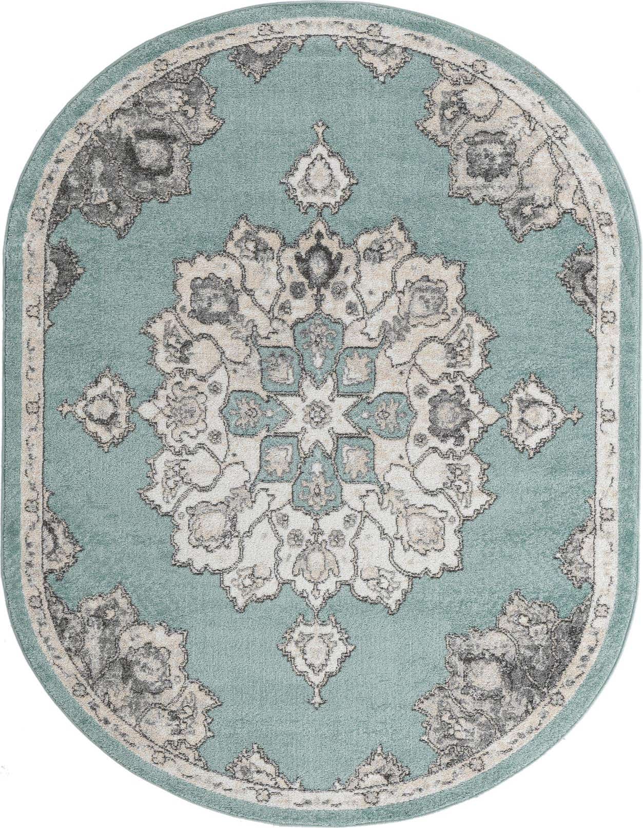 An oval 5'x8' blue traditional rug with a large central medallion and botanical patterns in cream and gray.