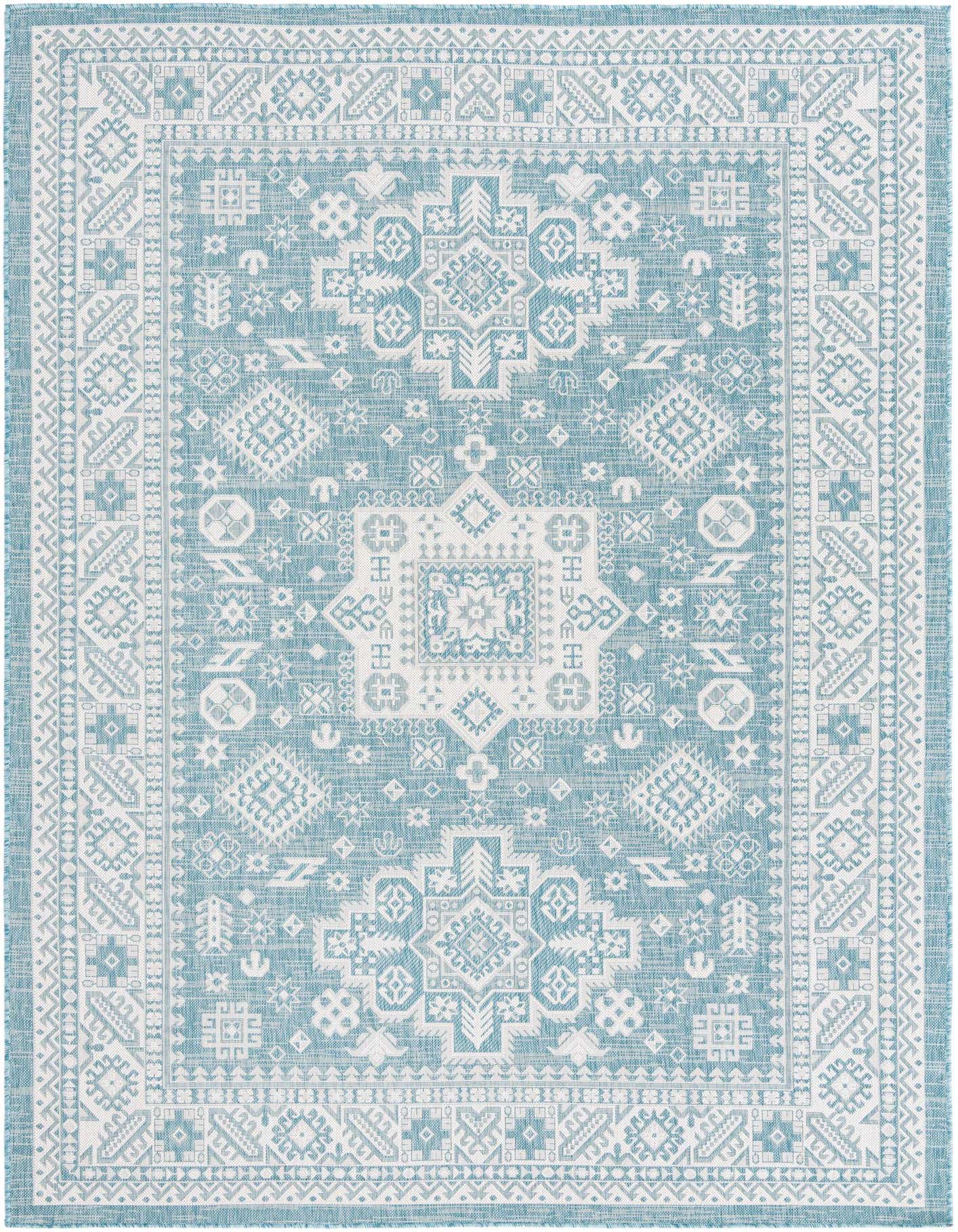 A 7x10 rectangular blue and white Southwestern-style flatweave rug with a tribal medallion pattern, suitable for indoor or outdoor use.
