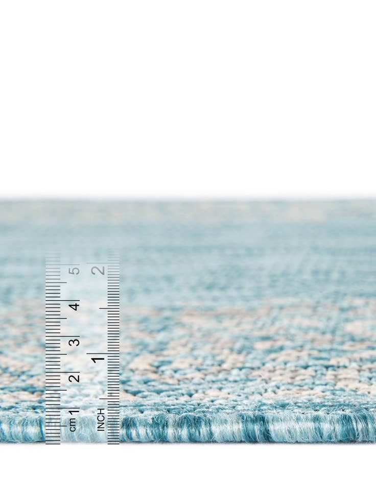 Detail image of  7' x 10'  Washable Border Indoor / Outdoor Rug