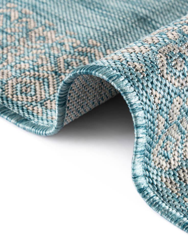 Detail image of  7' x 10'  Washable Border Indoor / Outdoor Rug