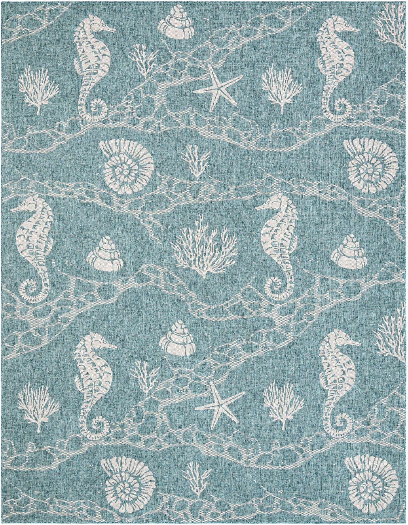 A 10x14 rectangular blue indoor/outdoor rug with a white coastal pattern featuring seahorses, starfish, shells, and coral.
