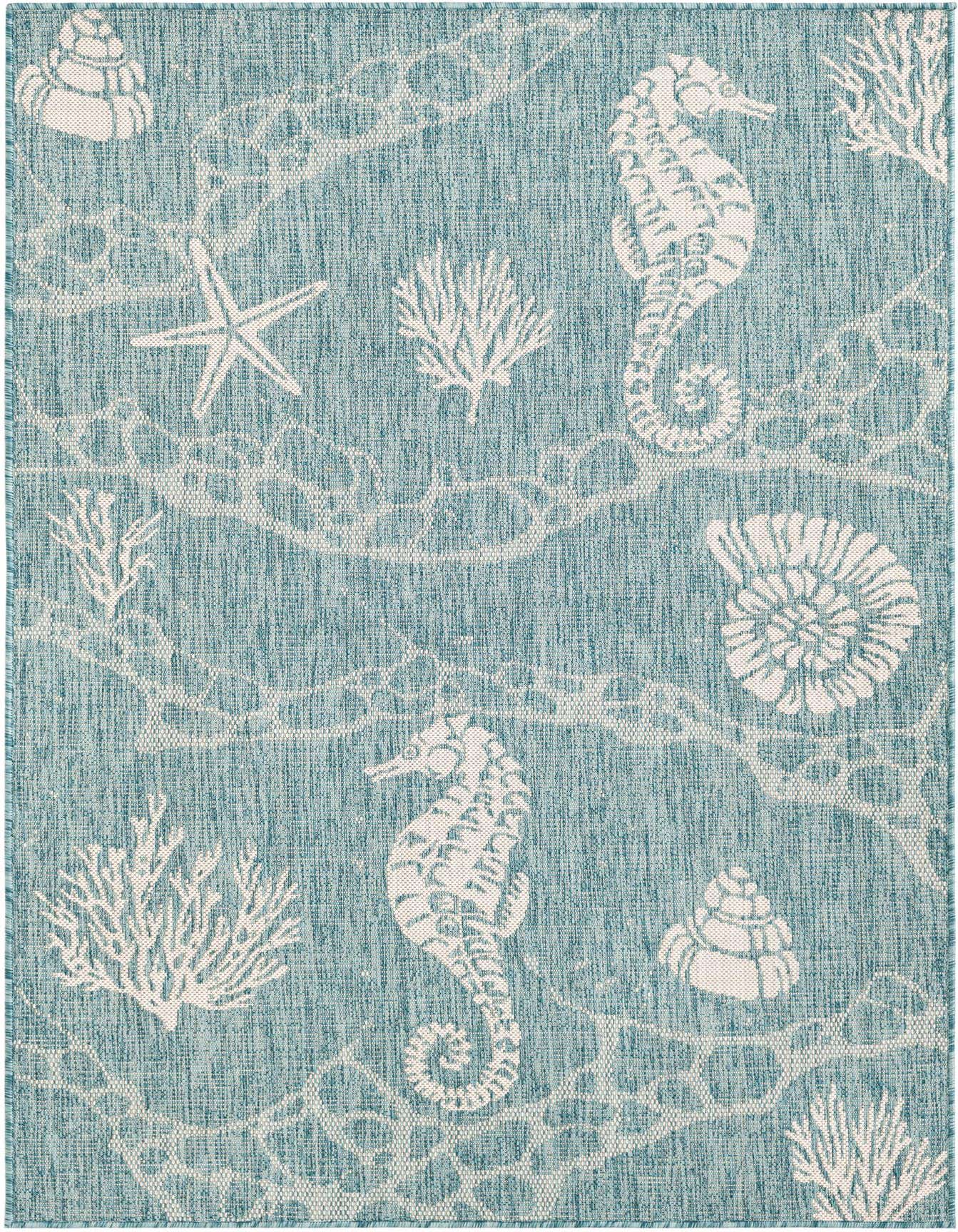 A 4x6 rectangular blue indoor/outdoor rug with a white coastal pattern featuring seahorses, starfish, and coral.