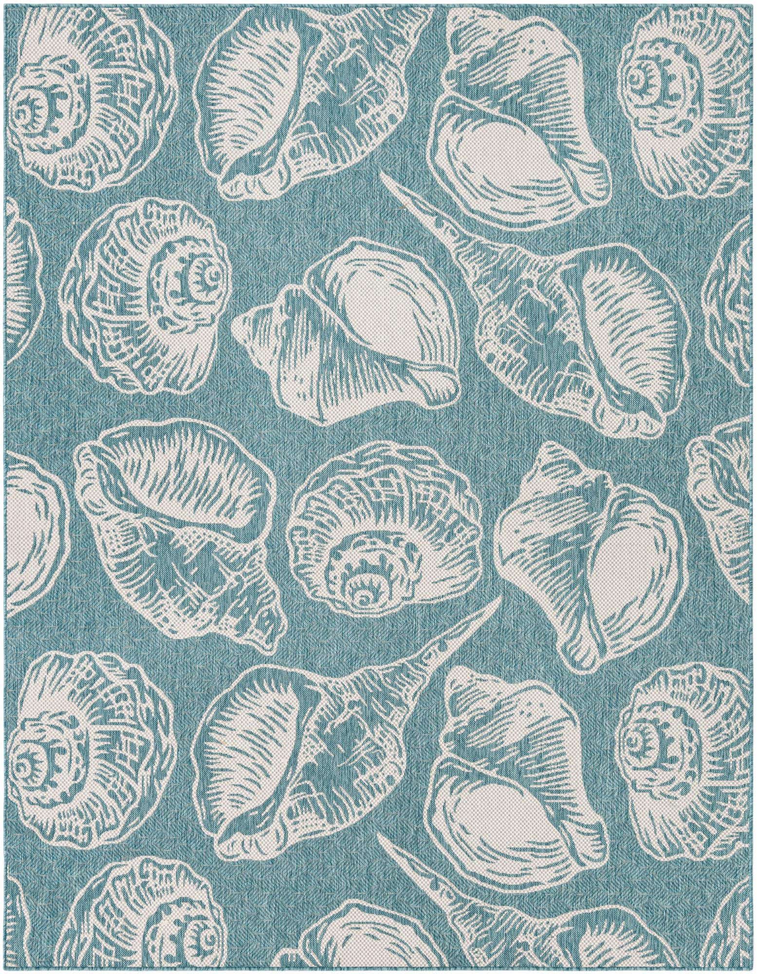An 8x10 rectangular blue indoor/outdoor rug with a repeating pattern of various white seashells.