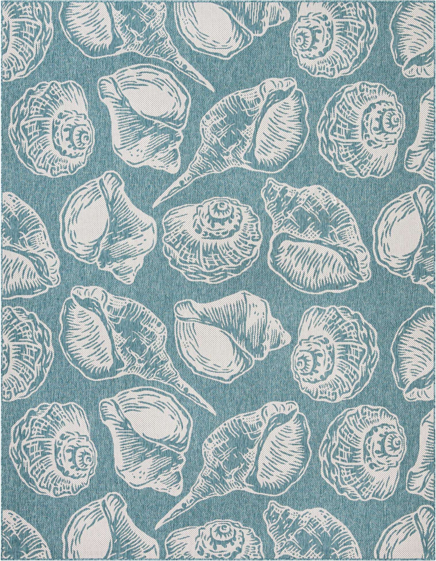 A 9x12 rectangular indoor/outdoor rug with a blue background and white seashell patterns, perfect for a patio or living room.
