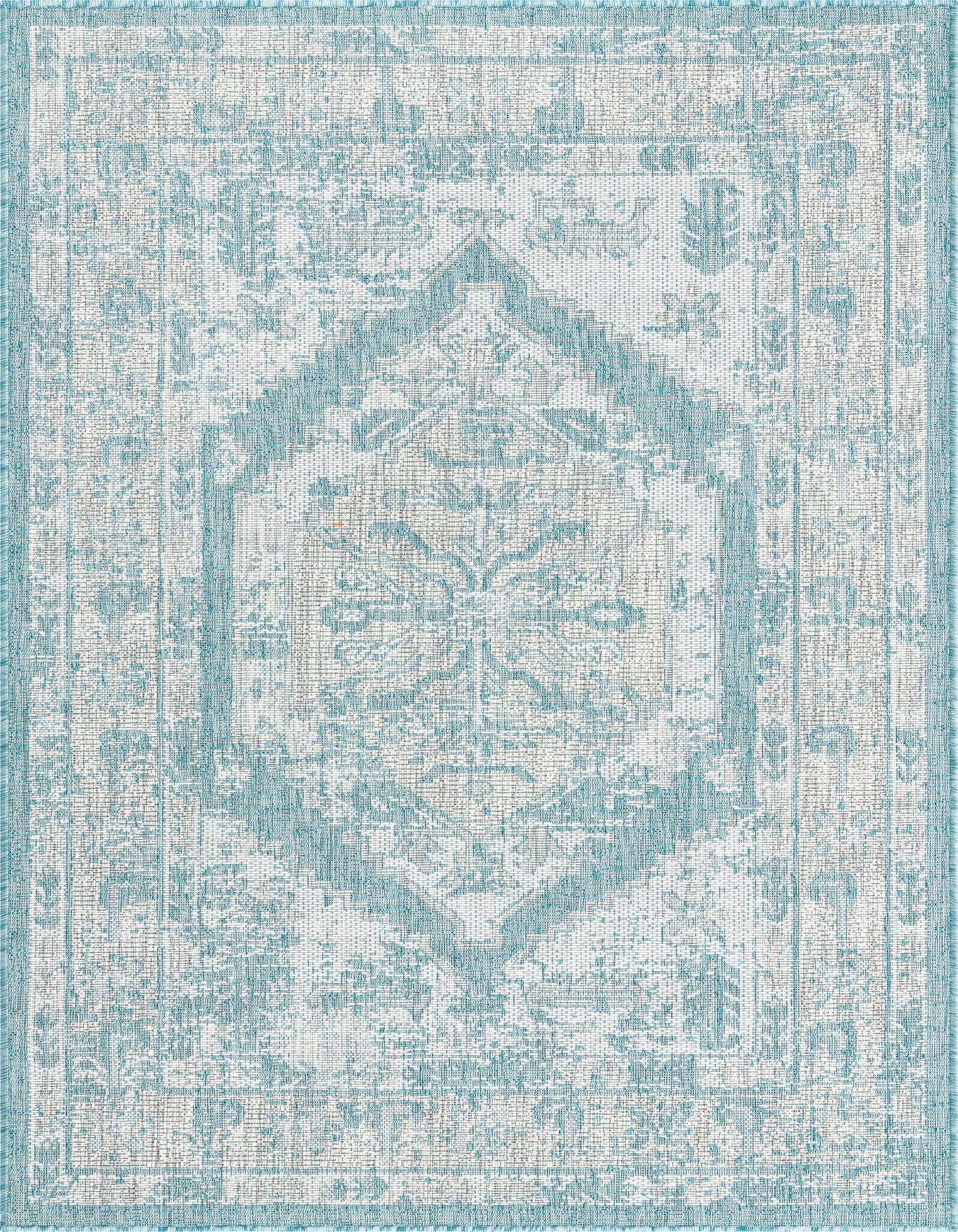 A 4x6 rectangular indoor/outdoor rug featuring a faded blue and white Southwestern traditional pattern with a central medallion.