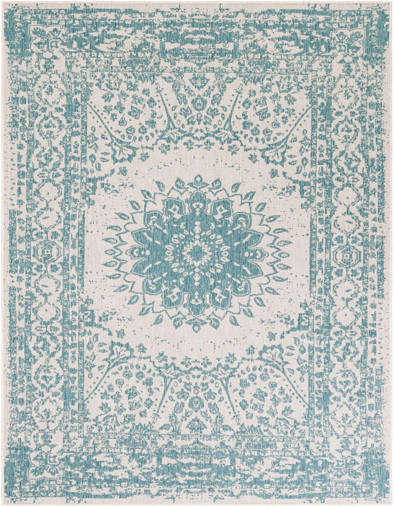 A 5x8 rectangular indoor/outdoor rug featuring a distressed blue traditional medallion pattern on a light beige background.