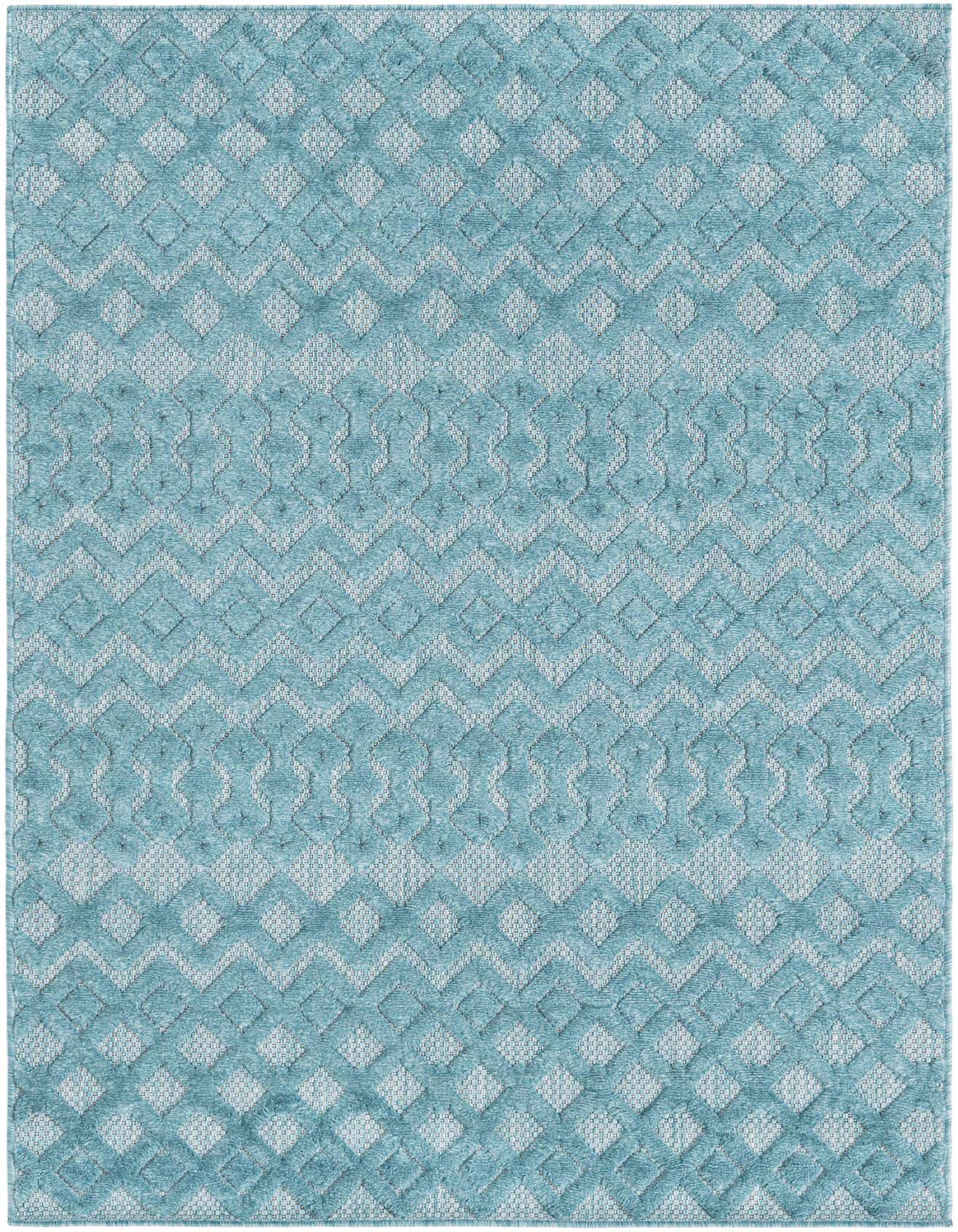 A 4x6 rectangular blue indoor/outdoor rug with a textured high-low tribal trellis pattern.