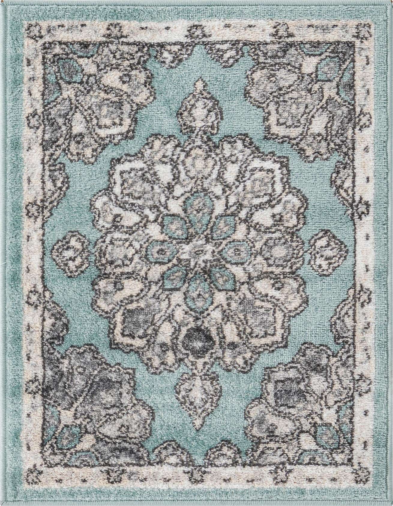 A 2x3 rectangular Parker collection rug featuring a distressed blue background with a traditional medallion and border pattern in shades of gray, cream, and darker blue.