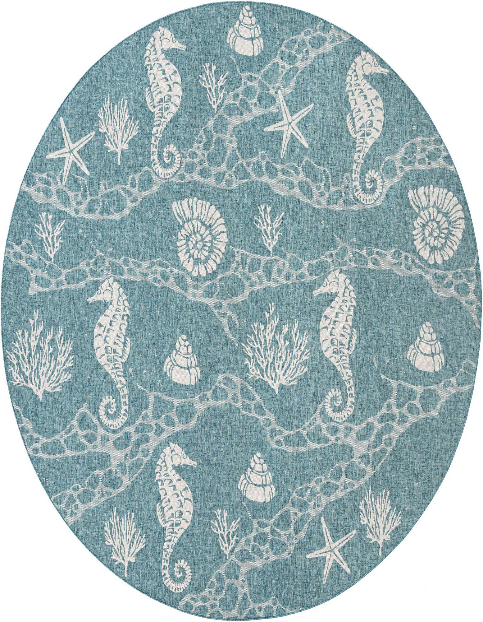 A round blue indoor/outdoor rug with a white coastal pattern featuring seahorses, starfish, seashells, and coral.