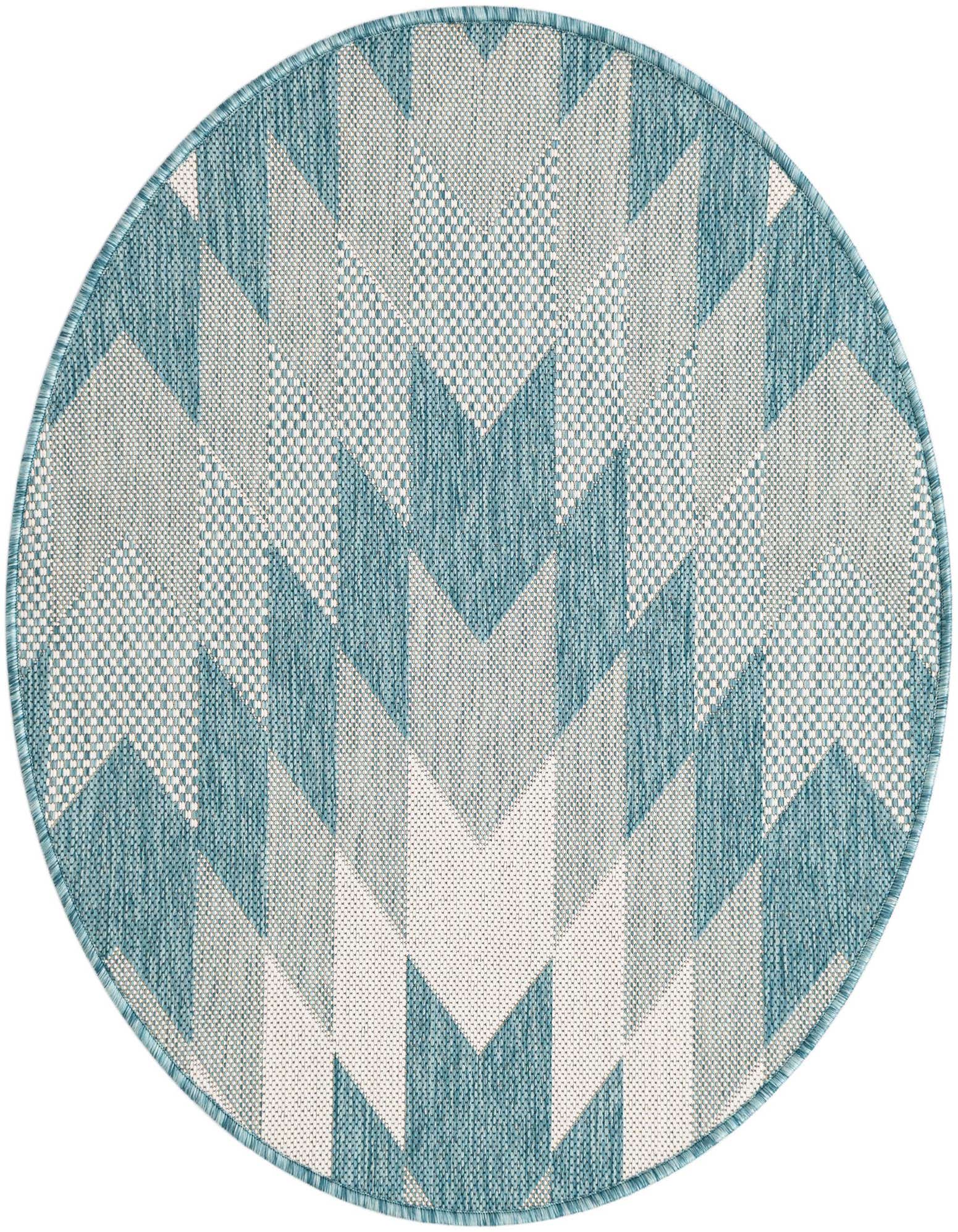 A 3' round blue and white tribal pattern outdoor rug, featuring a modern geometric design.