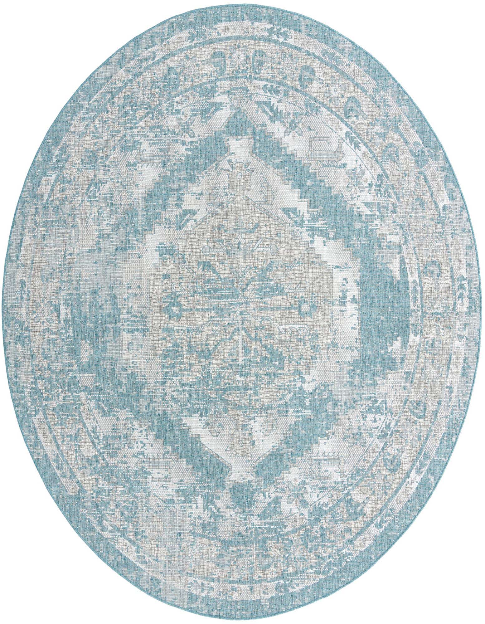 A large 13' round blue and beige Southwestern-style flatweave rug, ideal for indoor or outdoor patio use.