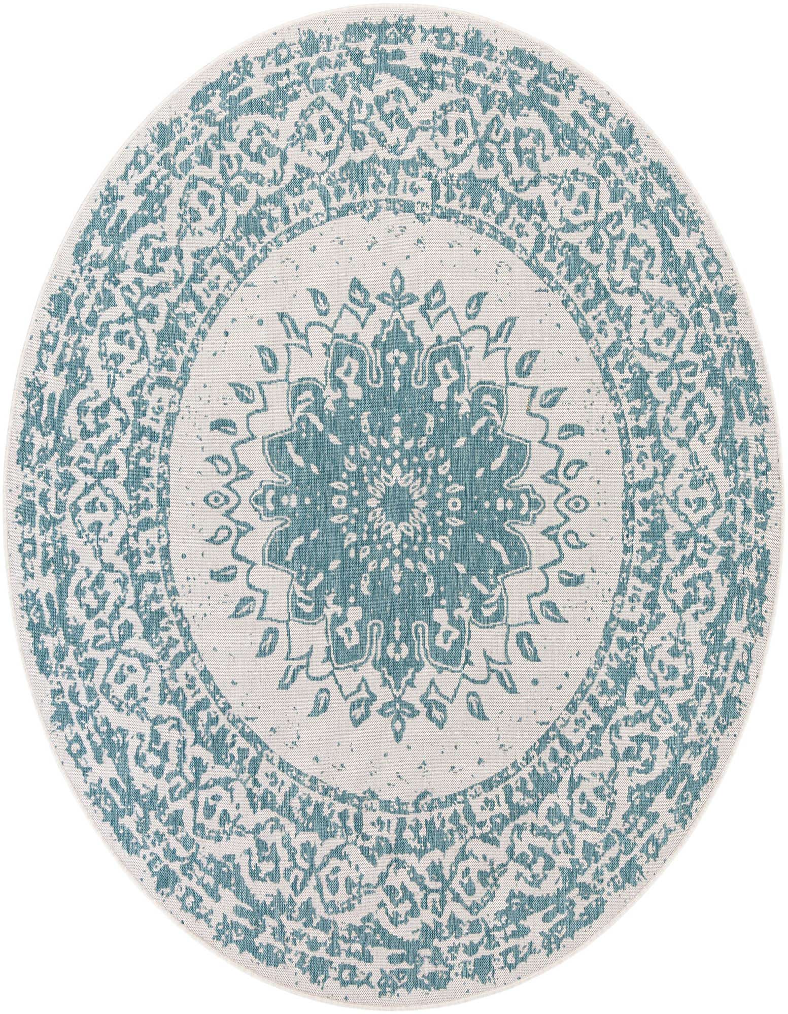 A 7' 10 round blue and white vintage medallion rug, ideal for indoor or outdoor spaces like a patio.