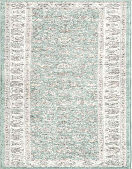 Aurelia 12 ft runner rug in shades of blue, grey, and cream, featuring a distressed traditional botanical pattern.