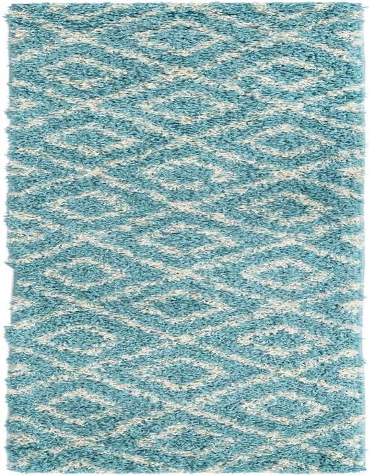 A long, plush 8 ft runner rug featuring a modern lattice pattern in varying shades of blue and cream.