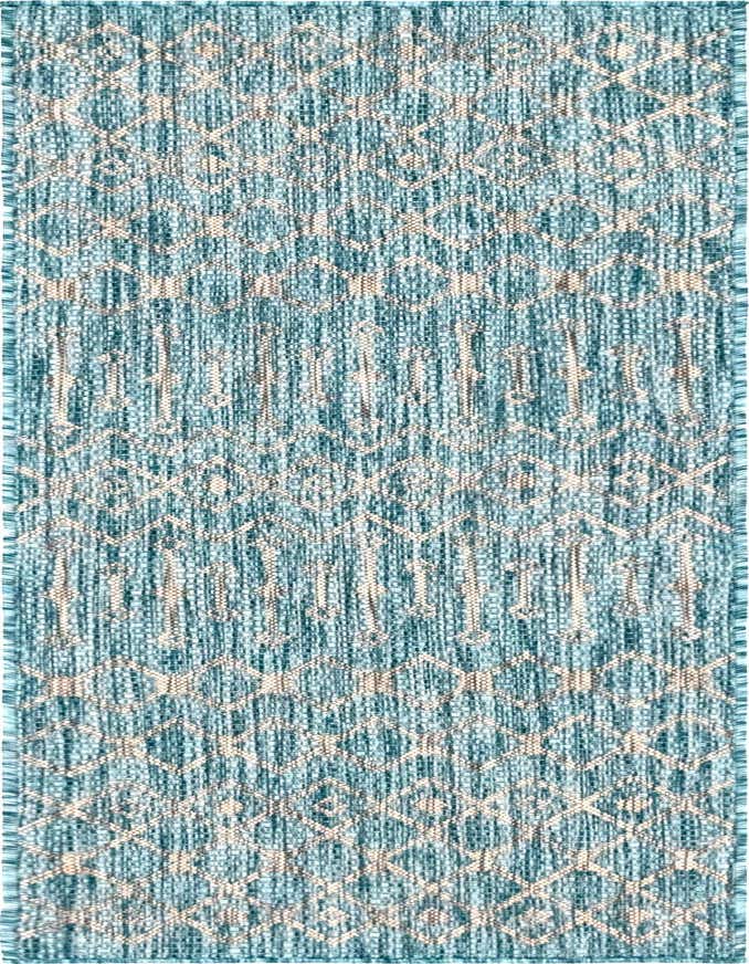 A 6 ft runner rug with a light blue and beige tribal lattice pattern, suitable for indoor/outdoor use.