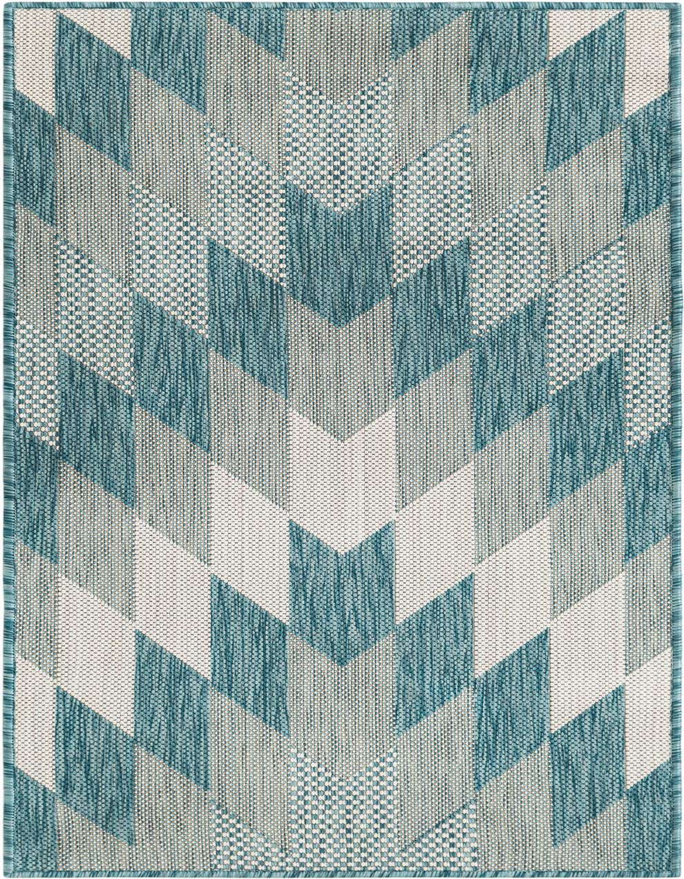 A 4 ft runner rug in shades of blue and white, featuring a modern tribal geometric pattern, suitable for hallways or patios.