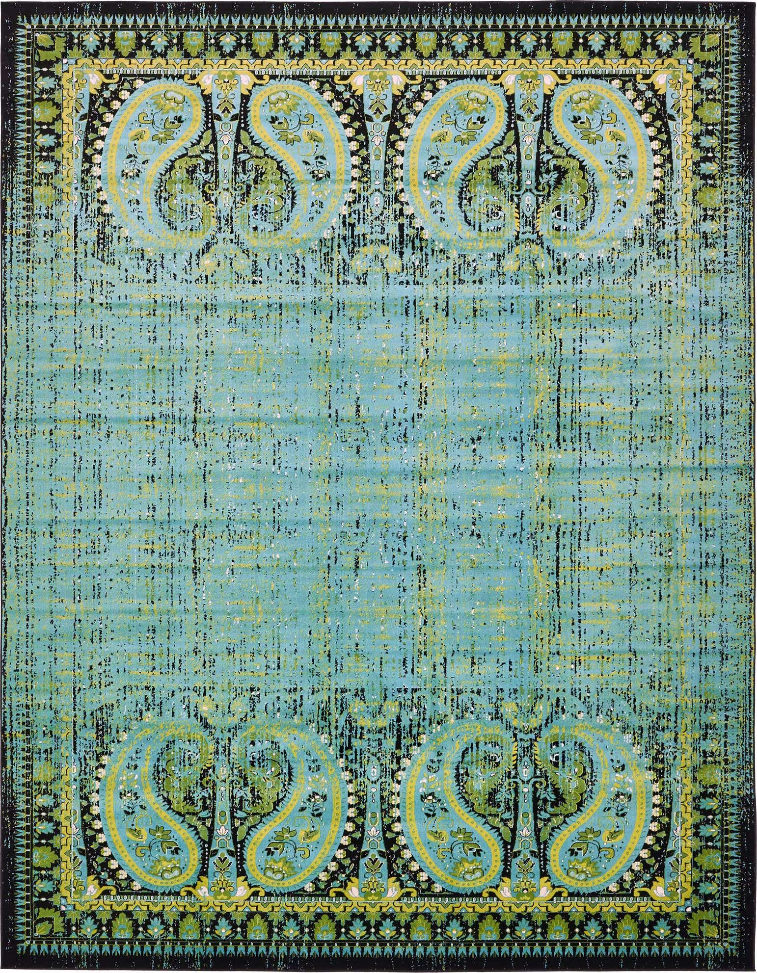 A 10x13 rectangular blue area rug featuring a distressed bohemian paisley pattern in teal, yellow, and black.