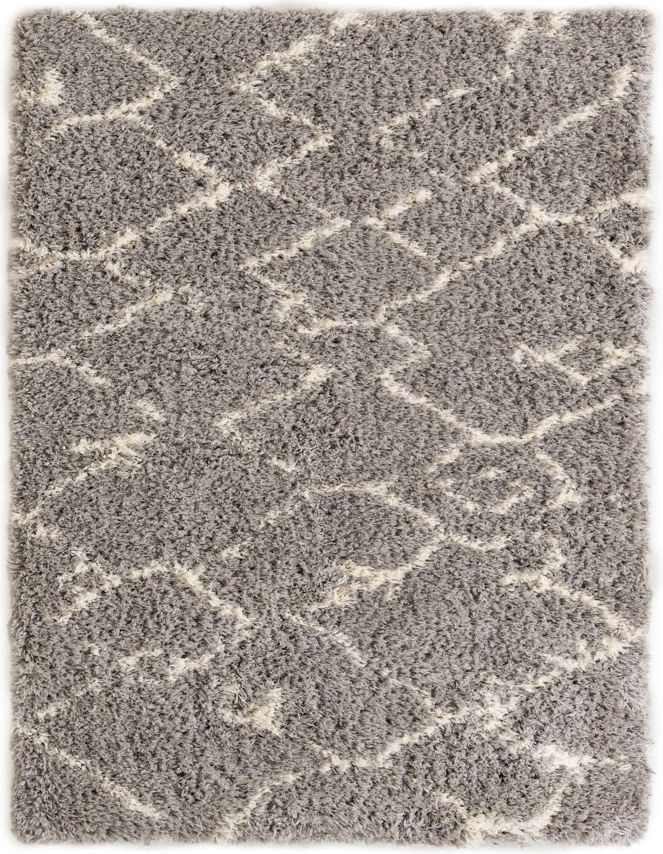 A 5x8 rectangular gray shag rug with a modern white geometric pattern, perfect for a living room.
