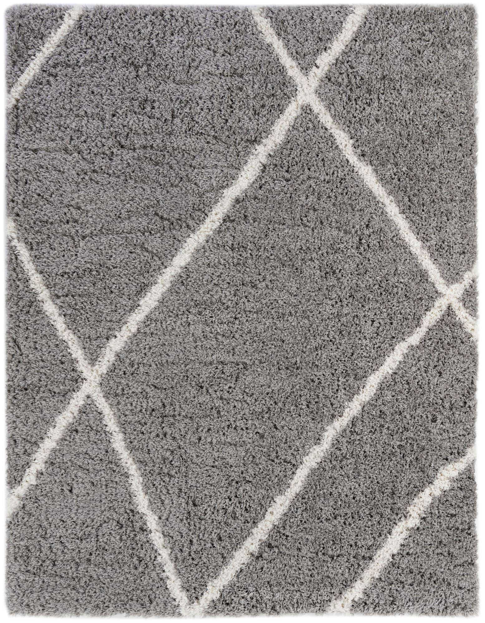 A soft gray shag rug with a modern white diamond trellis pattern, perfect for a living room.