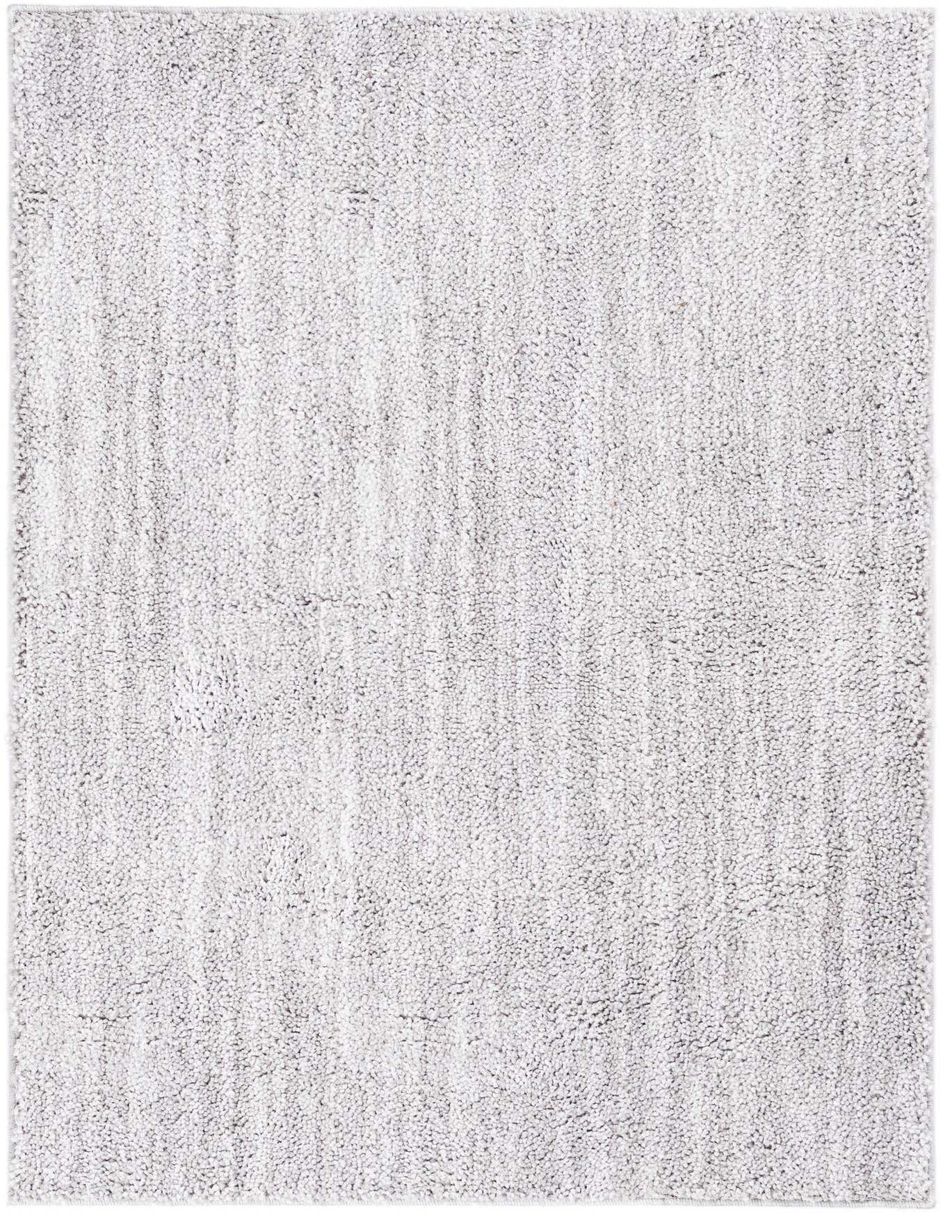 A 4x6 rectangular Jill Zarin Shaggy Chic rug in light gray, featuring a soft, textured shag pile.