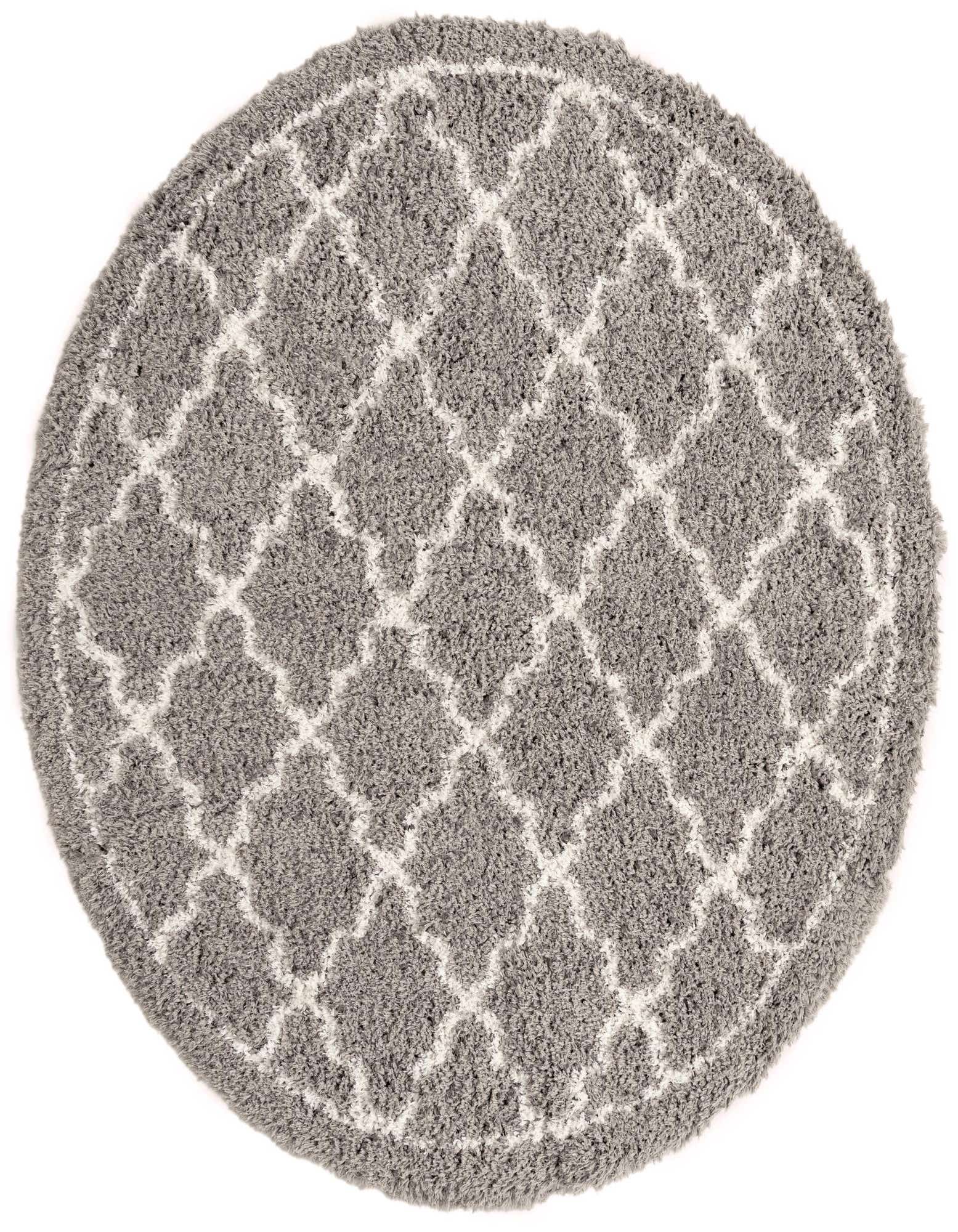 A round gray shag rug with a modern white trellis pattern, perfect for a cozy living room or bedroom.