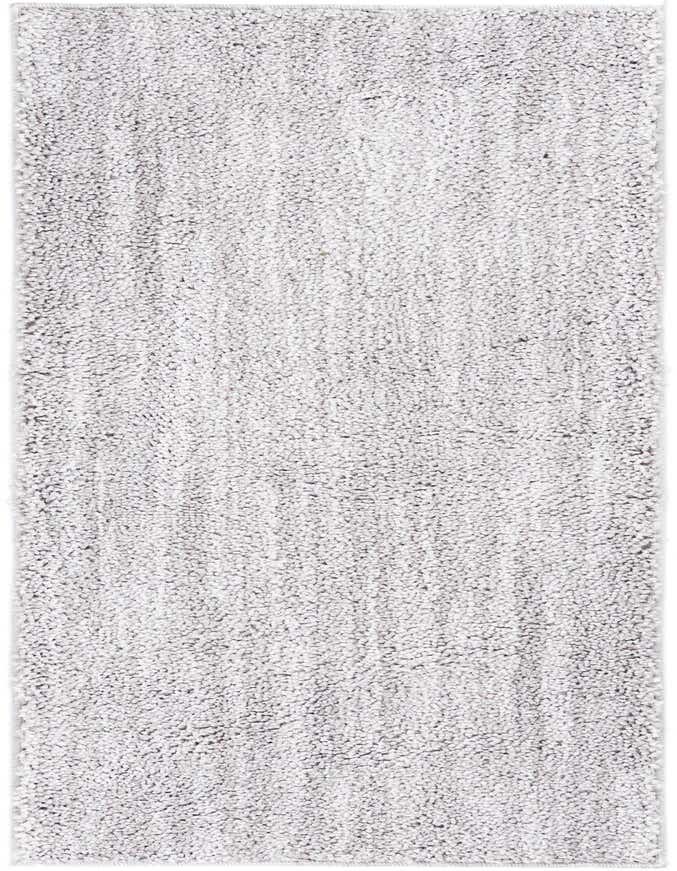 A soft, textured gray shag runner rug from the Jill Zarin Shaggy Chic collection, perfect for a modern hallway.
