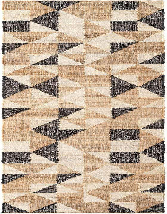 A 10 ft runner rug featuring a modern geometric pattern of beige, natural jute, and black triangles and squares.