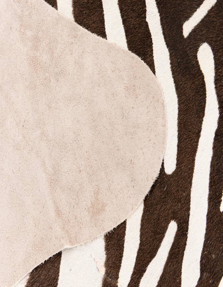 Detail image of  6' 5 x 7' 1 Cowhide Leather Freeform Rug