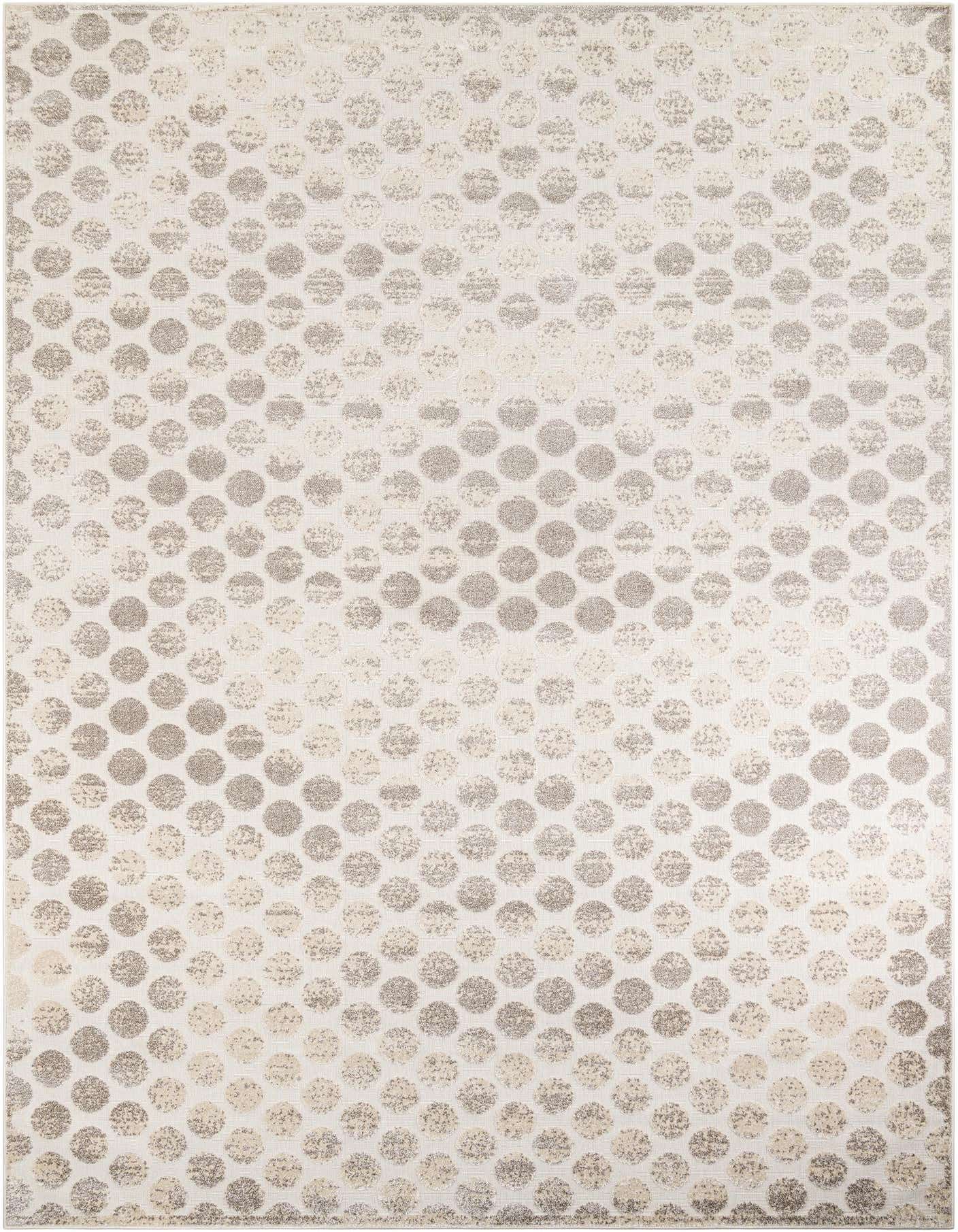 A 10x14 rectangular ivory and cream rug with a modern, abstract polka dot pattern, suitable for indoor or outdoor use.