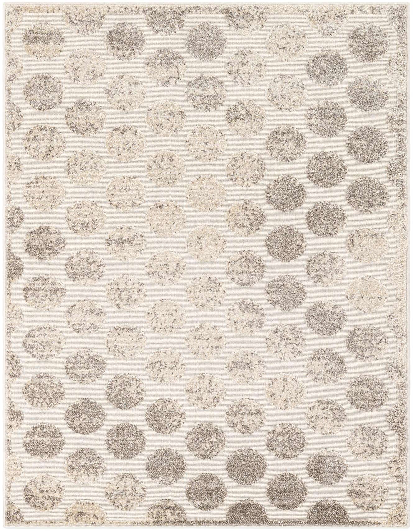 A 4x6 rectangular ivory and cream modern rug with a textured polka dot pattern, suitable for indoor or outdoor use.