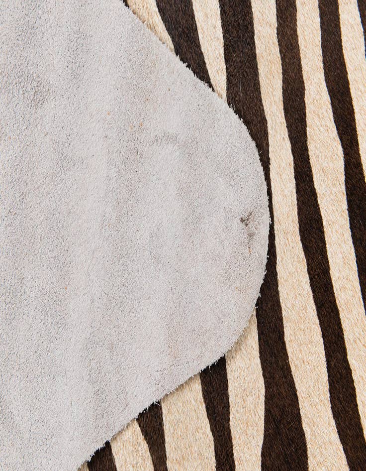 Detail image of  6' 1 x 6' 11 Cowhide Leather Freeform Rug
