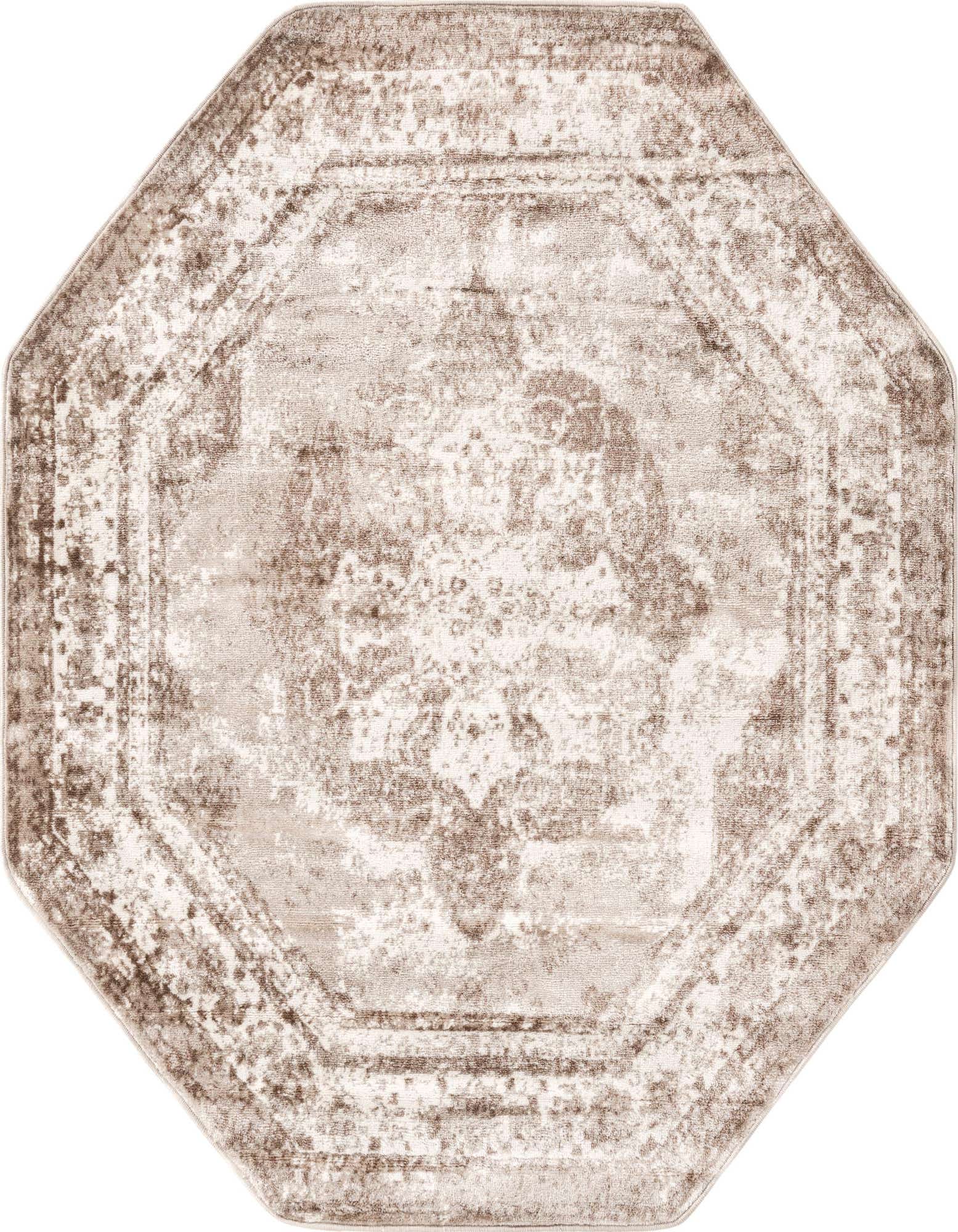 An octagon-shaped Monte Carlo rug in brown and ivory, featuring a distressed medallion pattern with a vintage feel.