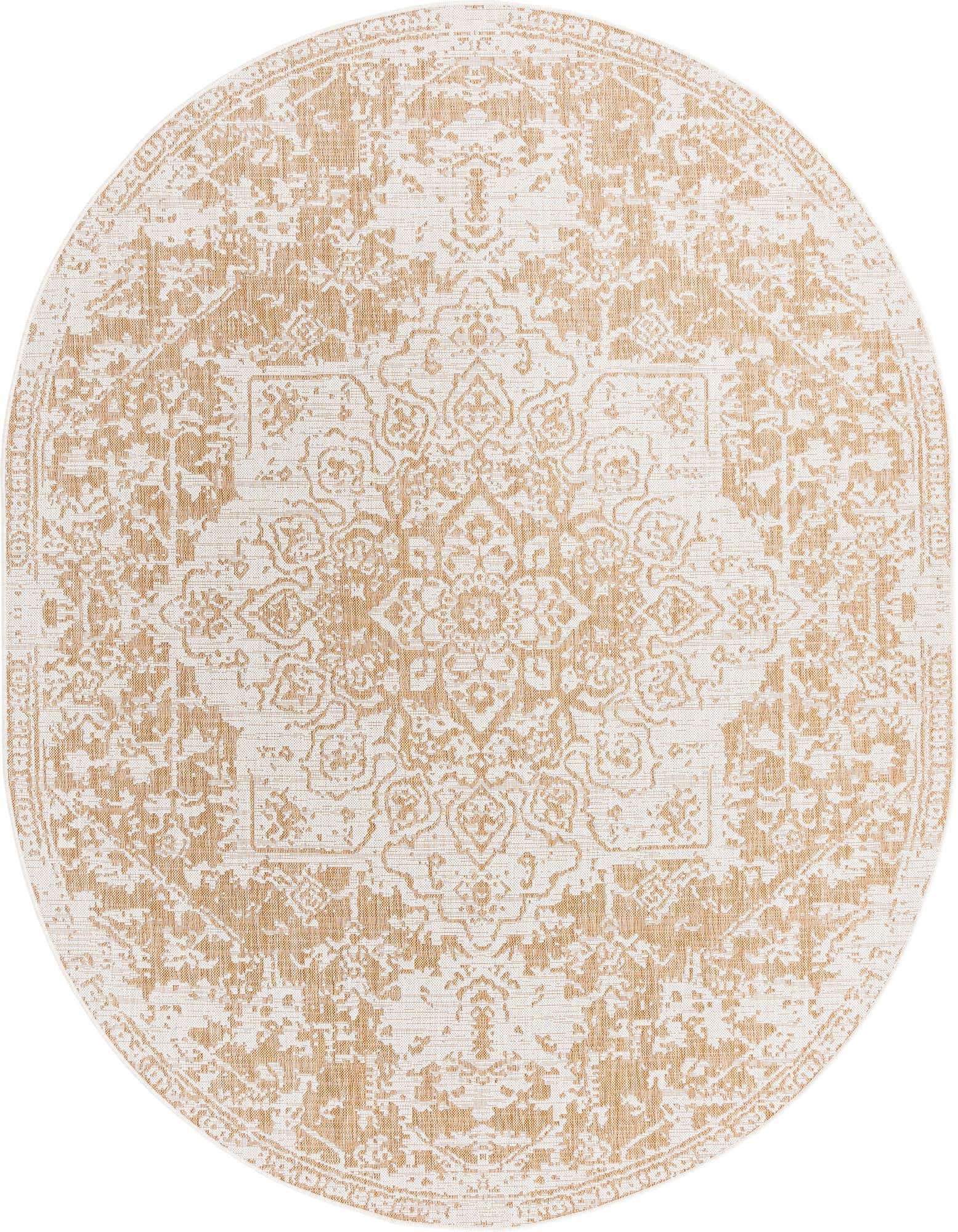 An oval 7' 10 x 10' 0 Jill Zarin Outdoor rug in brown and ivory with a textured Mediterranean medallion pattern.
