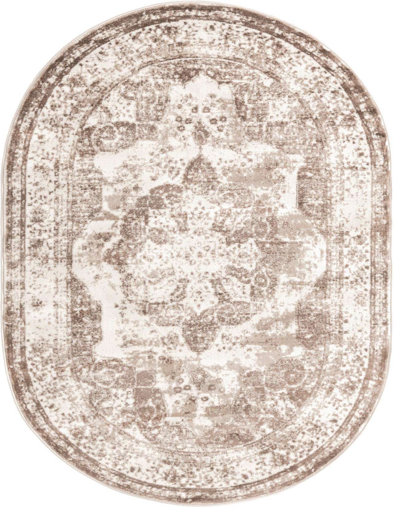 An oval 5' 3 x 8' 0 Monte Carlo rug in brown and ivory, featuring a distressed medallion pattern.