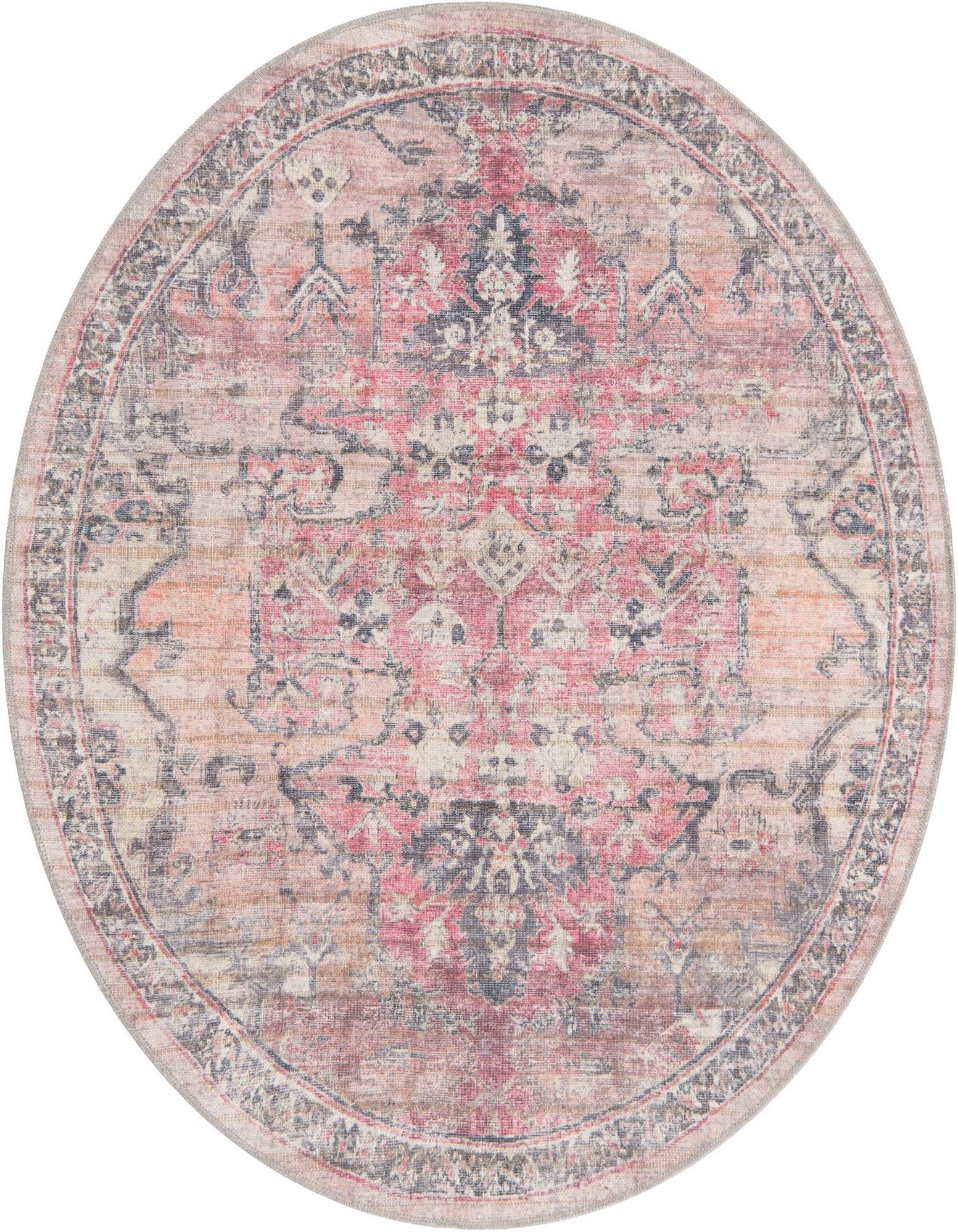 A 5' 3 round beige and pink traditional rug with a distressed vintage tribal pattern and dark border.