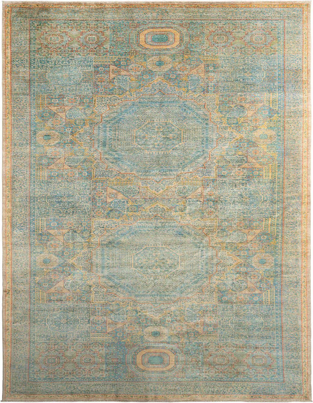 A rectangular handmade Persian rug in distressed teal, brown, and ivory with intricate traditional patterns.