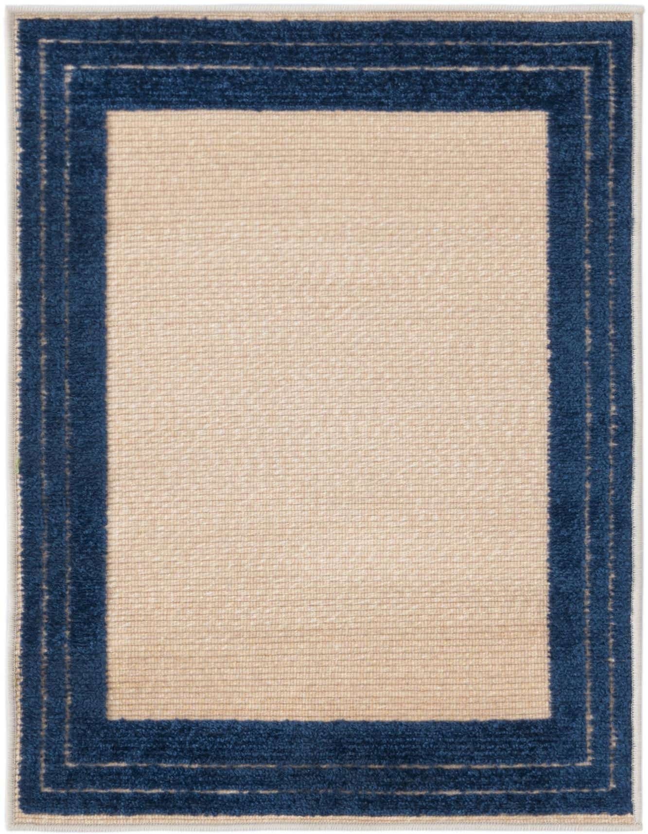 A 2x3 rectangular indoor/outdoor rug with a textured beige field and a thick navy blue border.