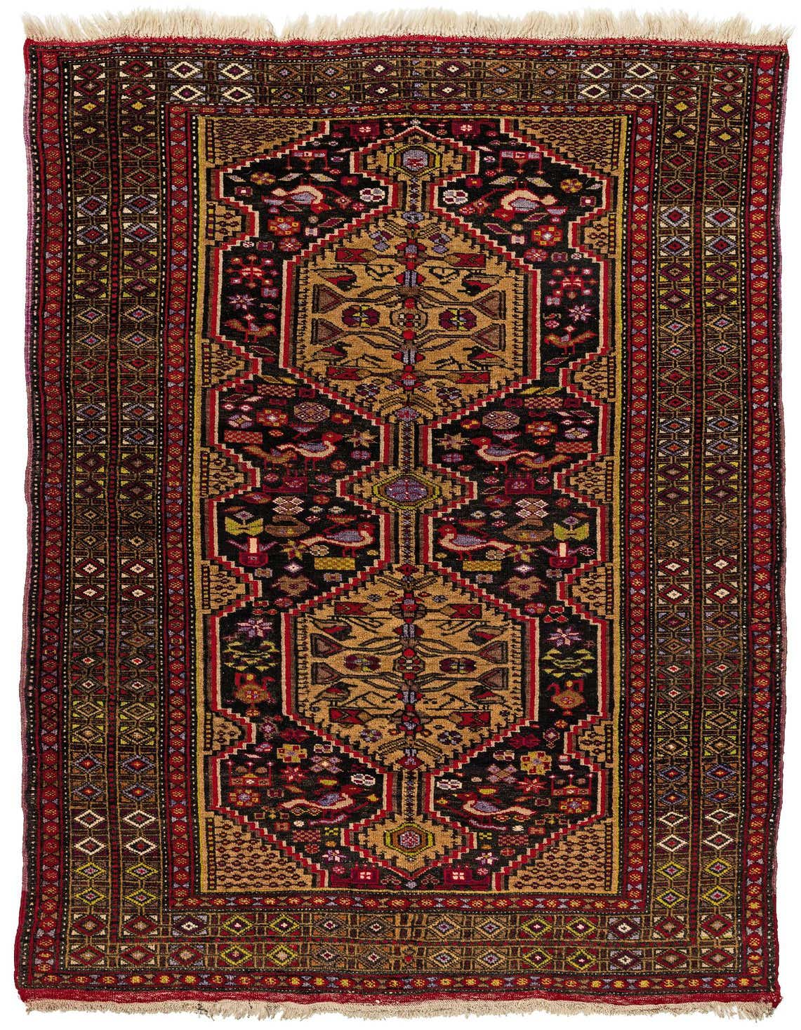 A 5x7 rectangular Balouch rug with a traditional tribal pattern in browns, tans, ivories, and black, featuring intricate medallion motifs and fringed ends.