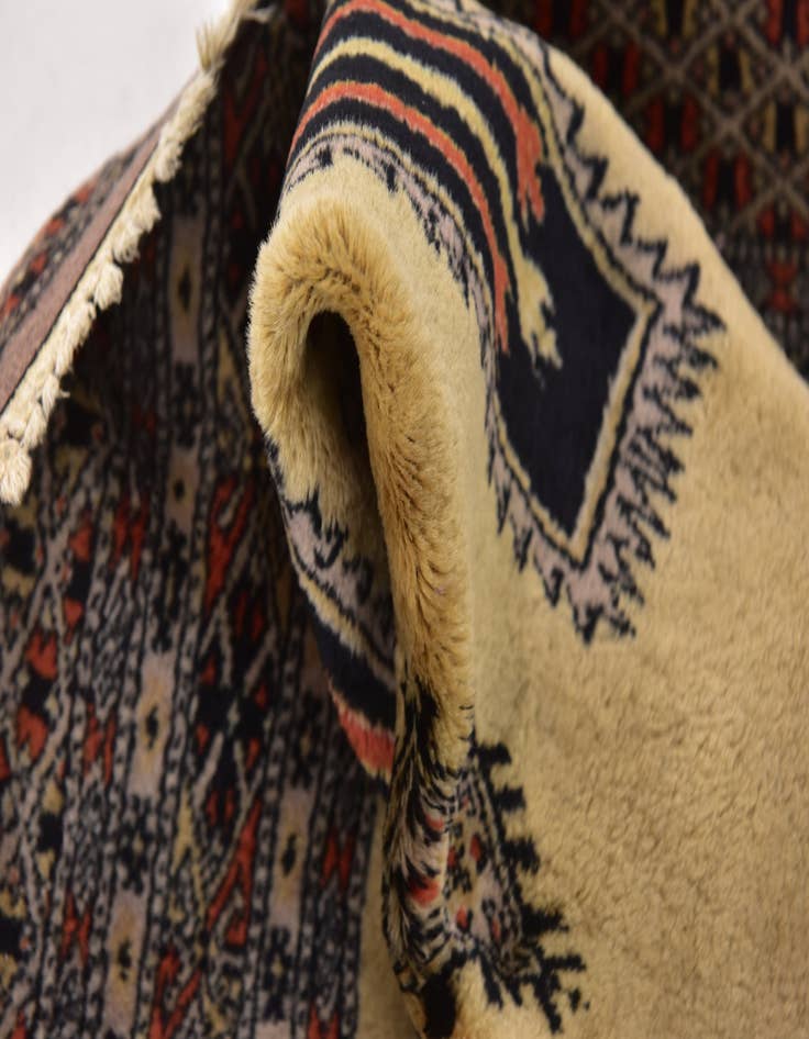 Detail image of  4' 3 x 6'  Hand Knotted Bokhara Oriental Wool Rug