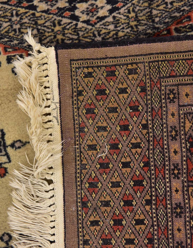 Detail image of  4' 3 x 6'  Hand Knotted Bokhara Oriental Wool Rug