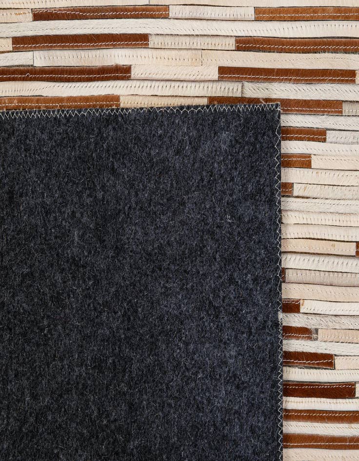 Detail image of  4' 11 x 8' 2 Cowhide - Patchwork Rug