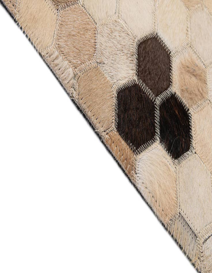 Detail image of  5' x 7' 11 Cowhide - Patchwork Rug